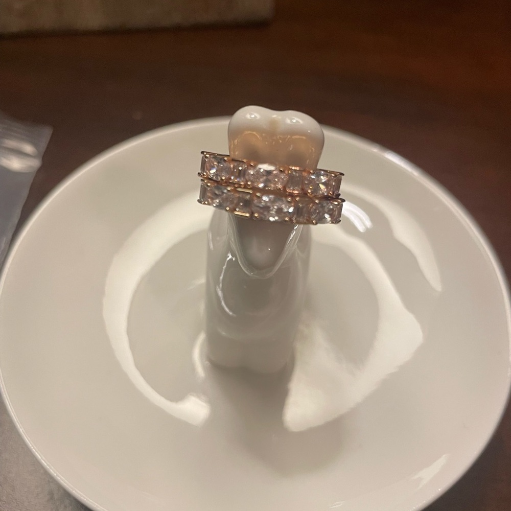 Two Diamonique baguette oval wedding rings.  size 4